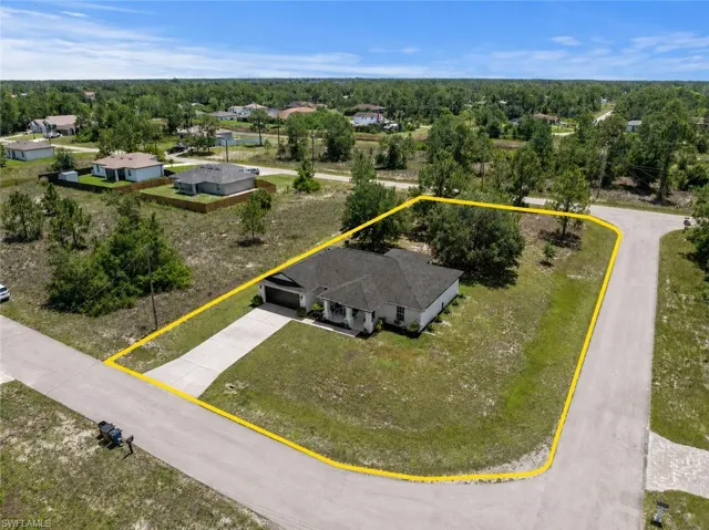 Beautiful curb appeal with fresh paint and a new roof. Situated on over a 1/2 acre of land!