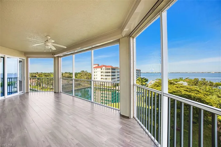 Tiled lanai with expansive views of the Marina and the Caloosahatchee