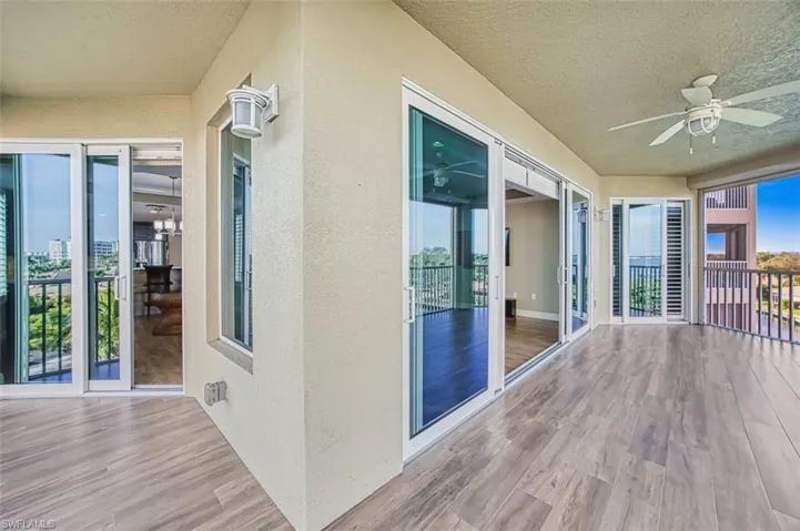 Lanai with tiled flooring with ceiling fan