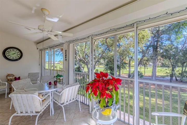 Sunroom / solarium with tile patterned flooring
