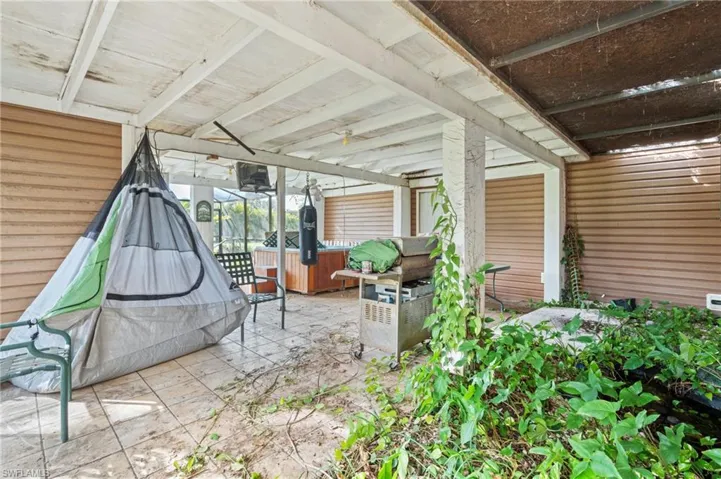 View of patio / terrace with a hot tub