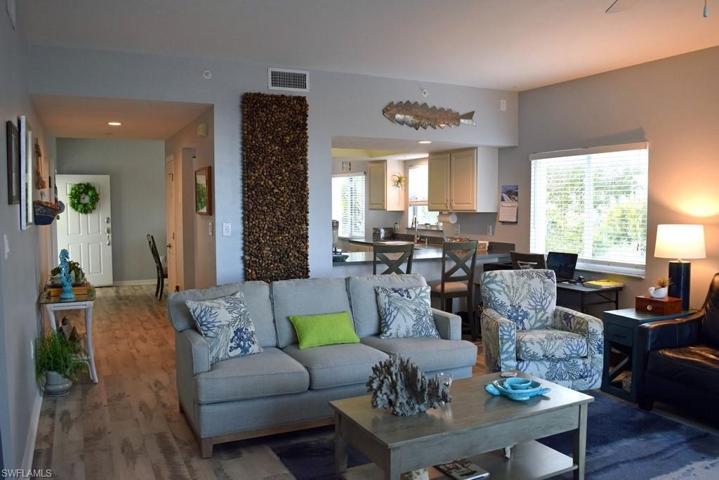 VIEW FROM LIVING AREA SHOWING ENTRANCE TO UNIT AT REAR LEFT.  ENTRANCE TO OWNER'S SUITE IS AT BOTTOM LEFT.