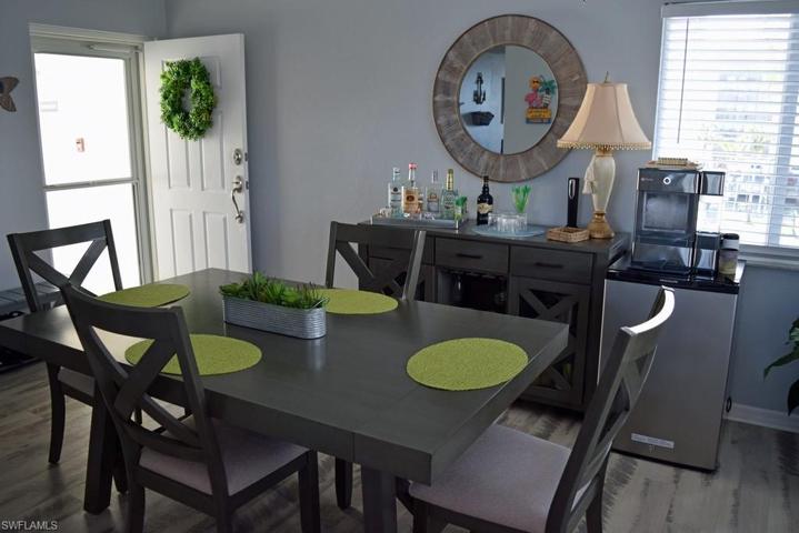 VIEW SHOWING ENTRY TO UNIT.  PORCELAIN TILE PLANK FLOORING.