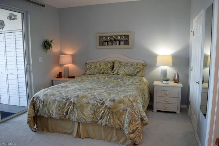 OWNER'S SUITE WITH DIRECT LANAI ACCESS.  ENTRANCE TO WALK-IN CLOSET IS SHOWN AT RIGHT REAR.  ENTRANCE TO EN-SUITE BATH IS AT BOTTOM RIGHT.