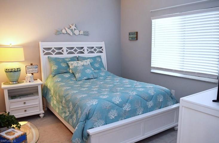 GUEST BEDROOM.  WALK-IN CLOSET IS TO LEFT.  CARPET NEW IN 2021.