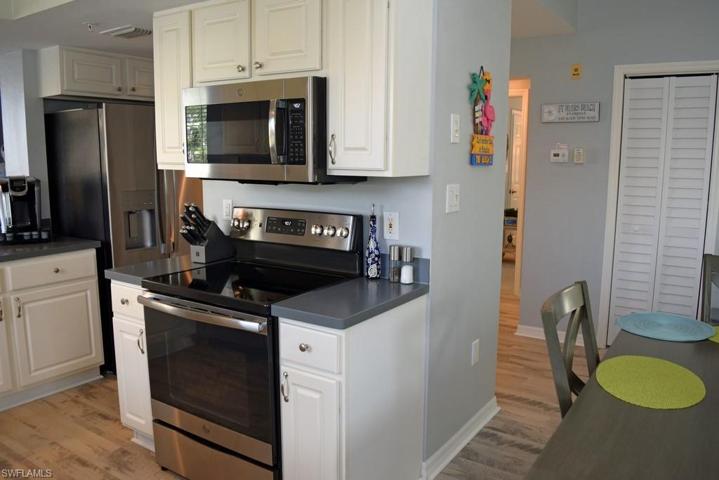 KITCHEN HAS SOLID SURFACE COUNTERTOPS.  STAINLESS STEEL APPLIANCES NEW IN 2018.