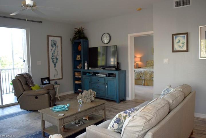 LIVING AREA SHOWING ENTRANCE TO OWNER'S SUITE