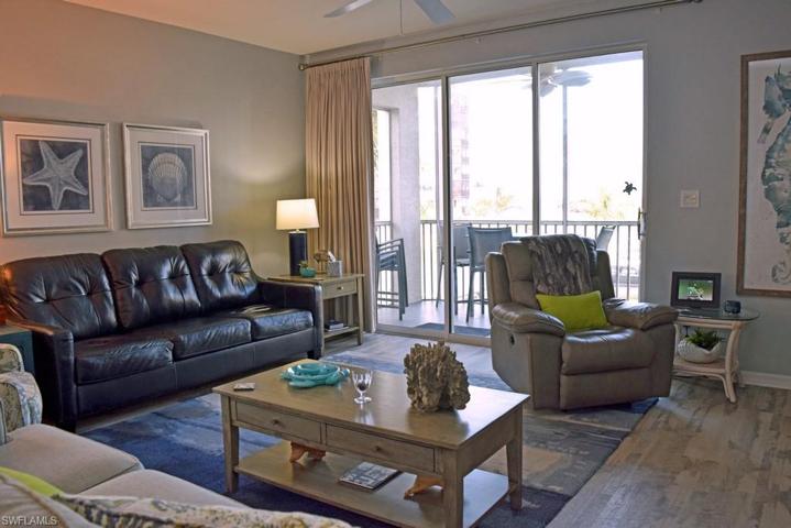 WATER VIEWS AND DIRECT LANAI ACCESS FROM THE LIVING AREA.  VOLUME CEILINGS THROUGHOUT.  PORCELAIN TILE PLANK FLOORING.