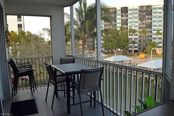 CORNER VIEW OFF LIVING AREA LANAI.  TABLE CONVENIENTLY EXPANDS TO ACCOMMODATE 6 PEOPLE.