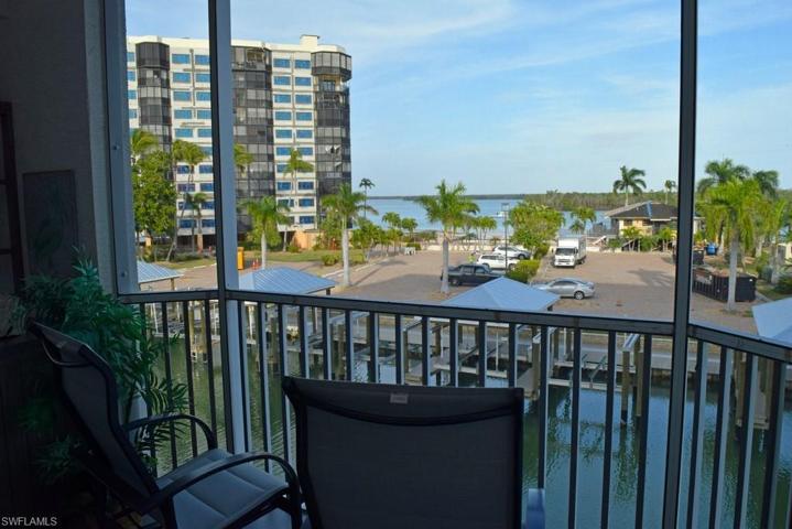 ESTERO BAY AND CANAL VIEWS.  THIS VIEW IS FROM THE OWNER'S SUITE END OF THE LANAI.