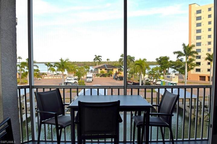 ESTERO BAY AND CANAL VIEWS FROM THE TILED AND SCREENED LANAI