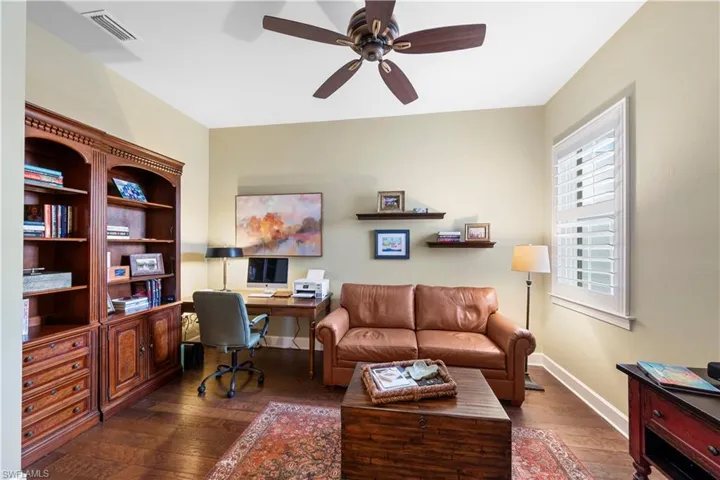 A separate office/den with wooden flooring and double solid dooors.