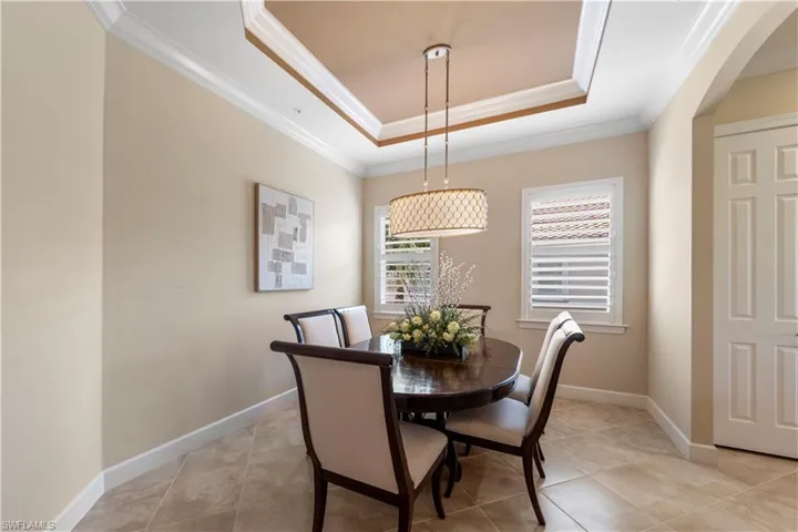 What a statement space! LOVE THE CHANDELIER!