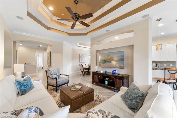Notice the Detailed and designer painted high tray ceilings!