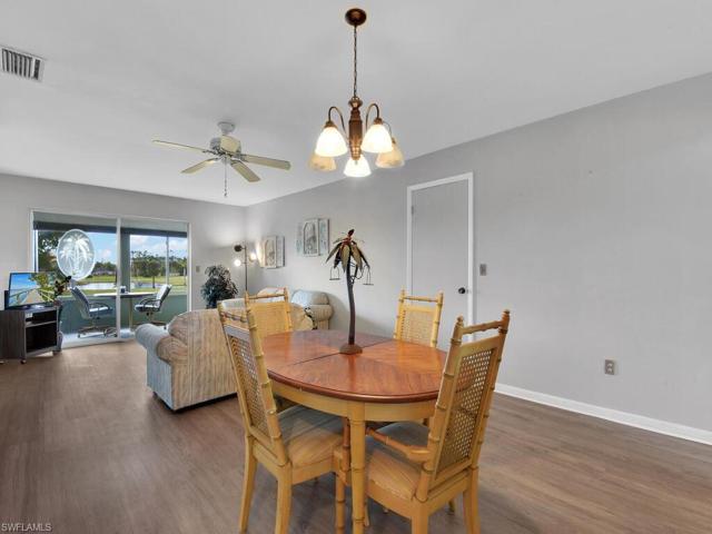 Large Open Concept Living/Dining Room with Updated Flooring