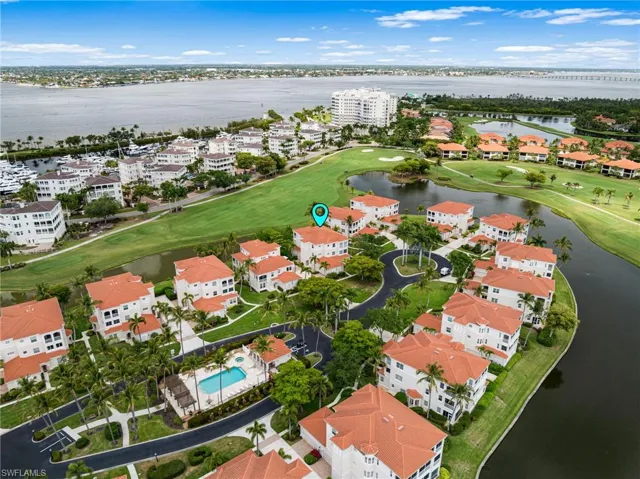 Breathtaking views showcase the widest stretch of the 10th fairway and tranquil lake vistas, all just steps from the community pool.