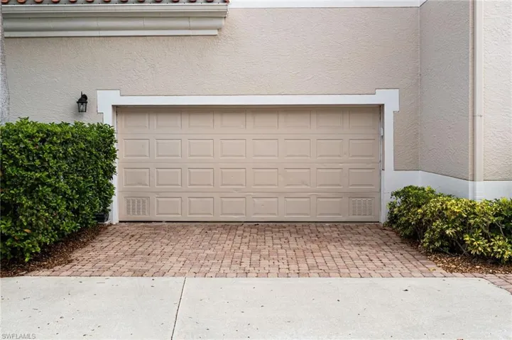 2 car garage and pavered area.