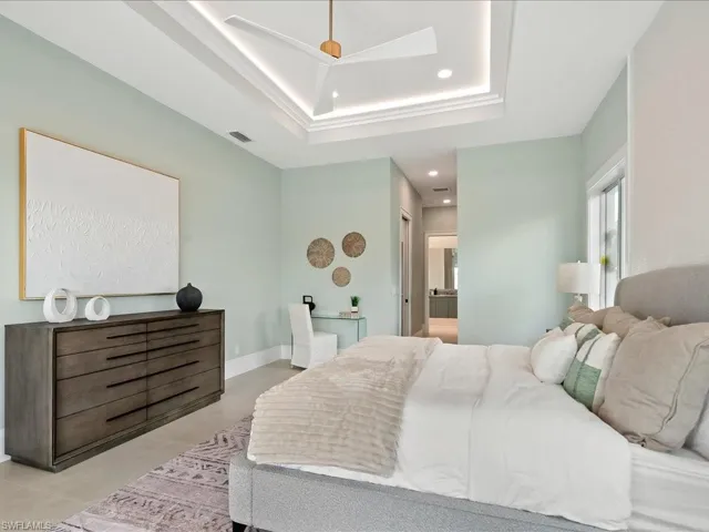 Spacious primary suite with abundant natural light