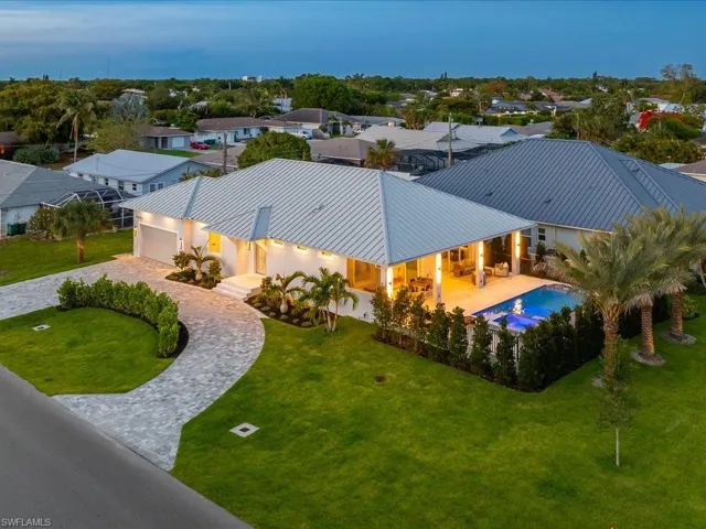 Oversized corner homesite with expansive setbacks and elevated positioning