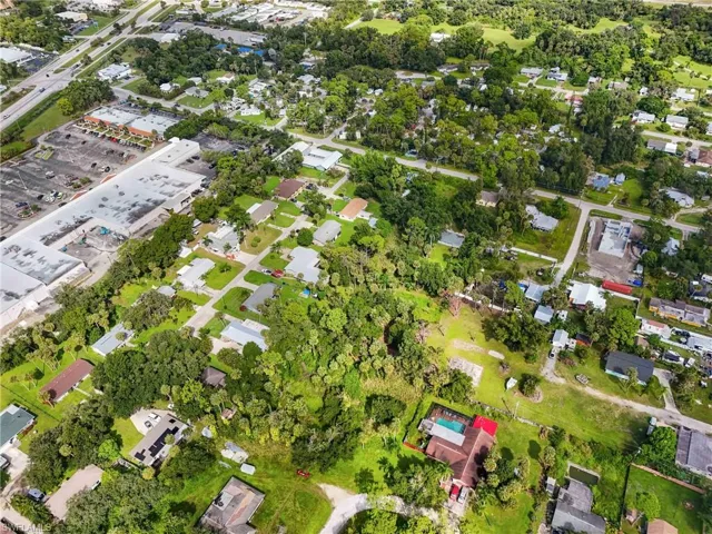 View of property location with nearby suburban area