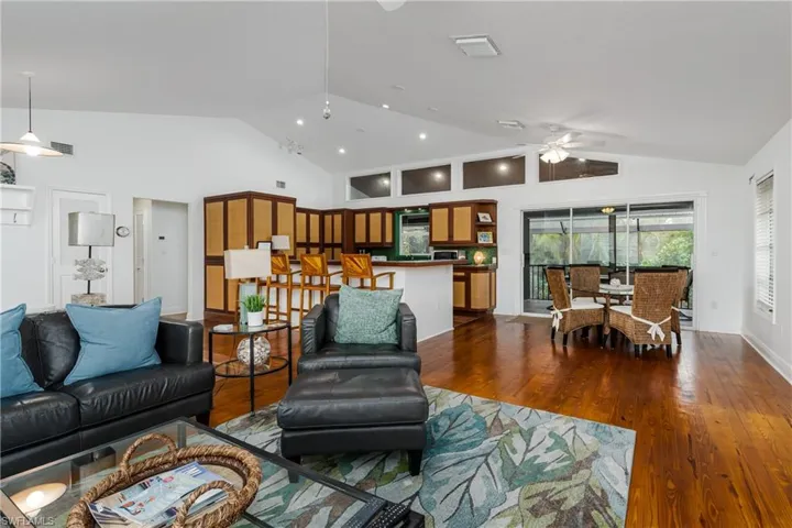 Great room has beautiful wood floors