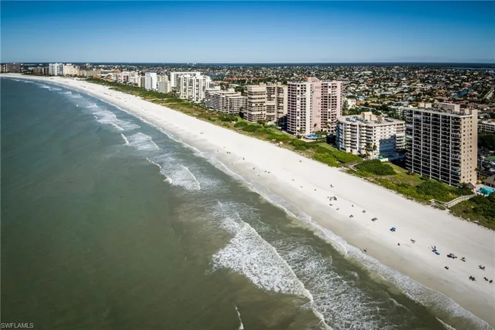 Marco Island's beautiful, white sand beach 2 blocks from this home