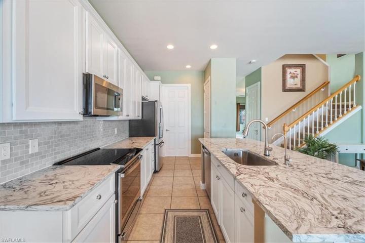Wood cabinets with quarts top