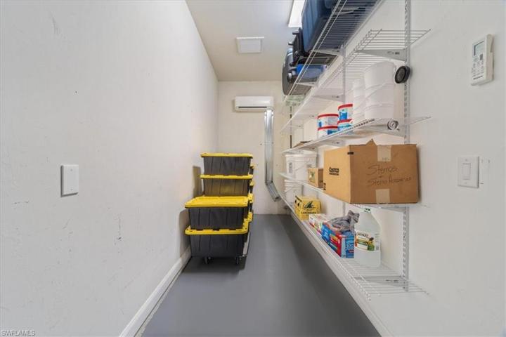 Air-conditioned secret storage room in garage