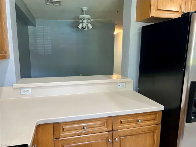 Bathroom featuring ceiling fan