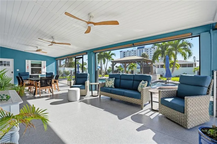 View of patio / terrace featuring outdoor lounge area and outdoor dining space - Virtually Edited Image