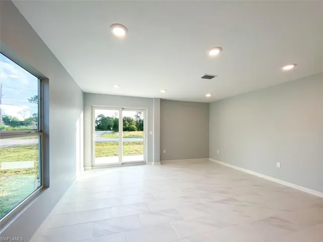 Empty room with recessed lighting