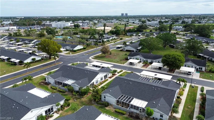 Aerial overview of property's location with nearby suburban area