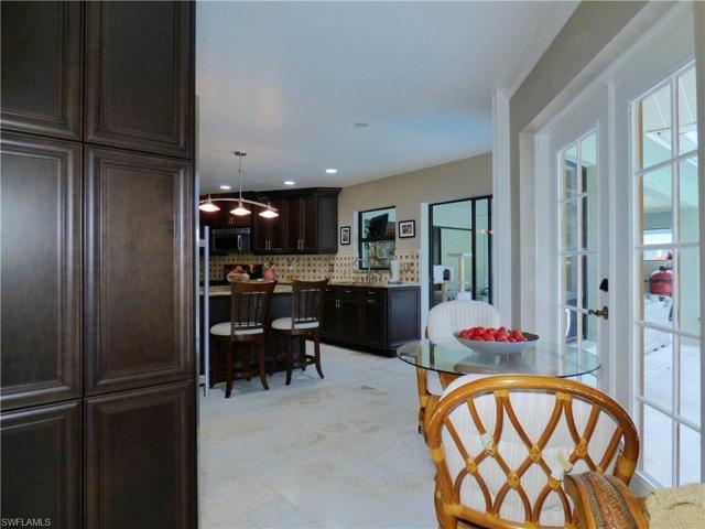 Breakfast Area With French Doors To The Pool Area