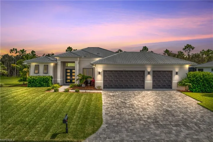 View of front Elevation at dawn.
