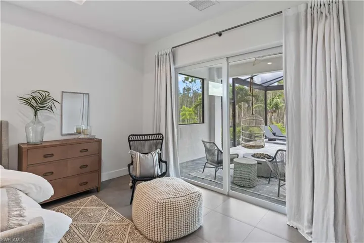 Sitting room with light tile floors