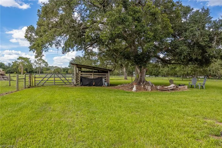 View of yard with a gate