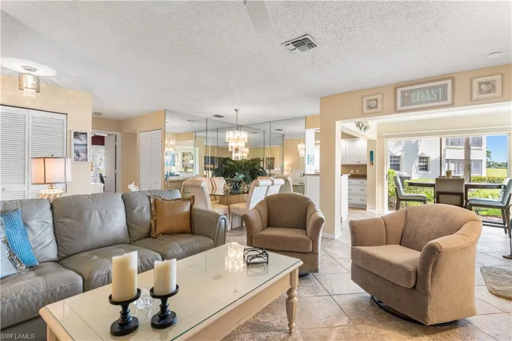This condo flows seamlessly from living room to lanai.