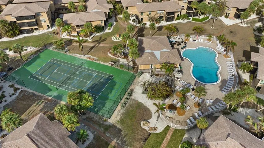 Aerial view of residential area with a pool