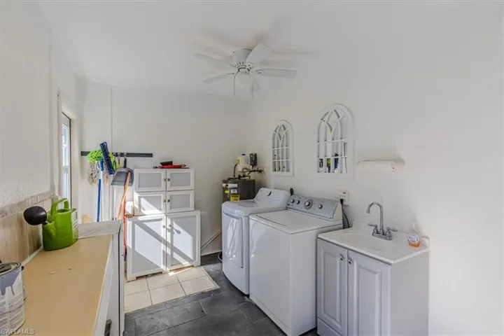 Laundry with utility sink and storage