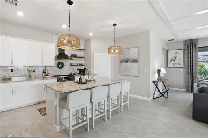Kitchen with decorative light fixtures
