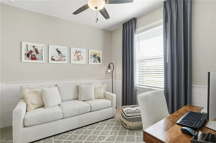 Living area featuring an office area