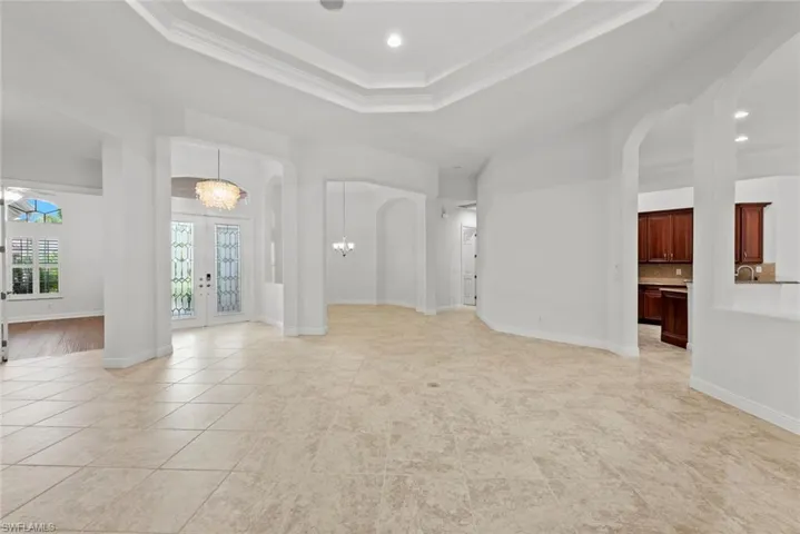 Living room looking to formal dining area