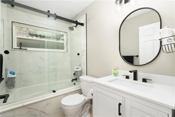 Guest bathroom upgraded by previous owners in 2024.