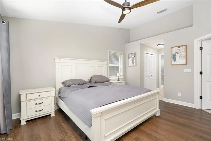 Primary bedroom is split from guest bedrooms for added privacy. En-suite bathroom with two walk-in closets with lots of storage space. Some built-ins.