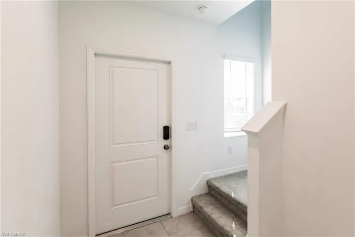 Stairway with tile patterned flooring
