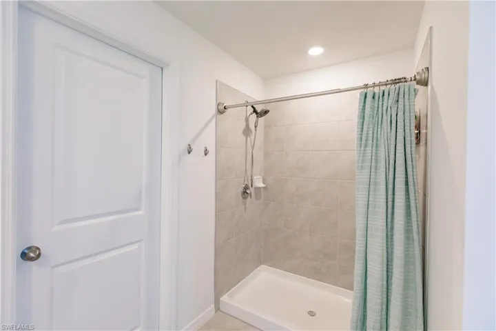 Bathroom featuring walk in shower