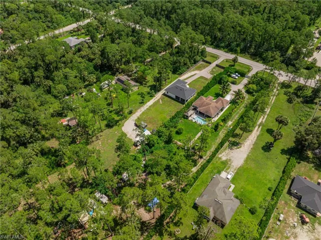 Drone / aerial view of a heavily wooded area