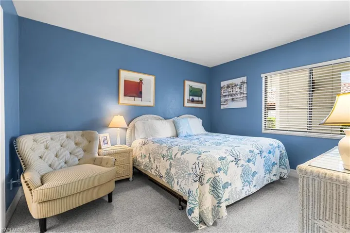 Bedroom with carpet flooring