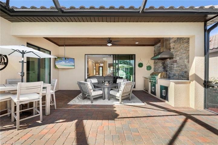 Ample Outdoor Living Space and Built-In Grill