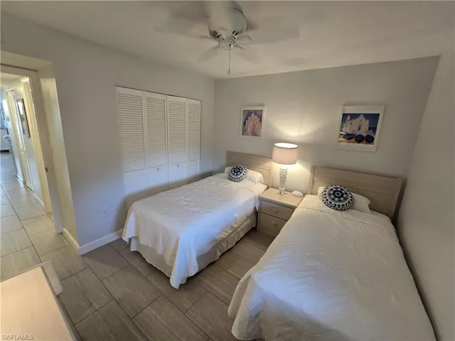 Super Second Bedroom with 2 Beds, Lamps, Ceiling Fan, Closet and Window for Natural Light!